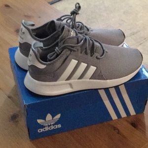 Addidas relaxing shoes for man, new with tag.
